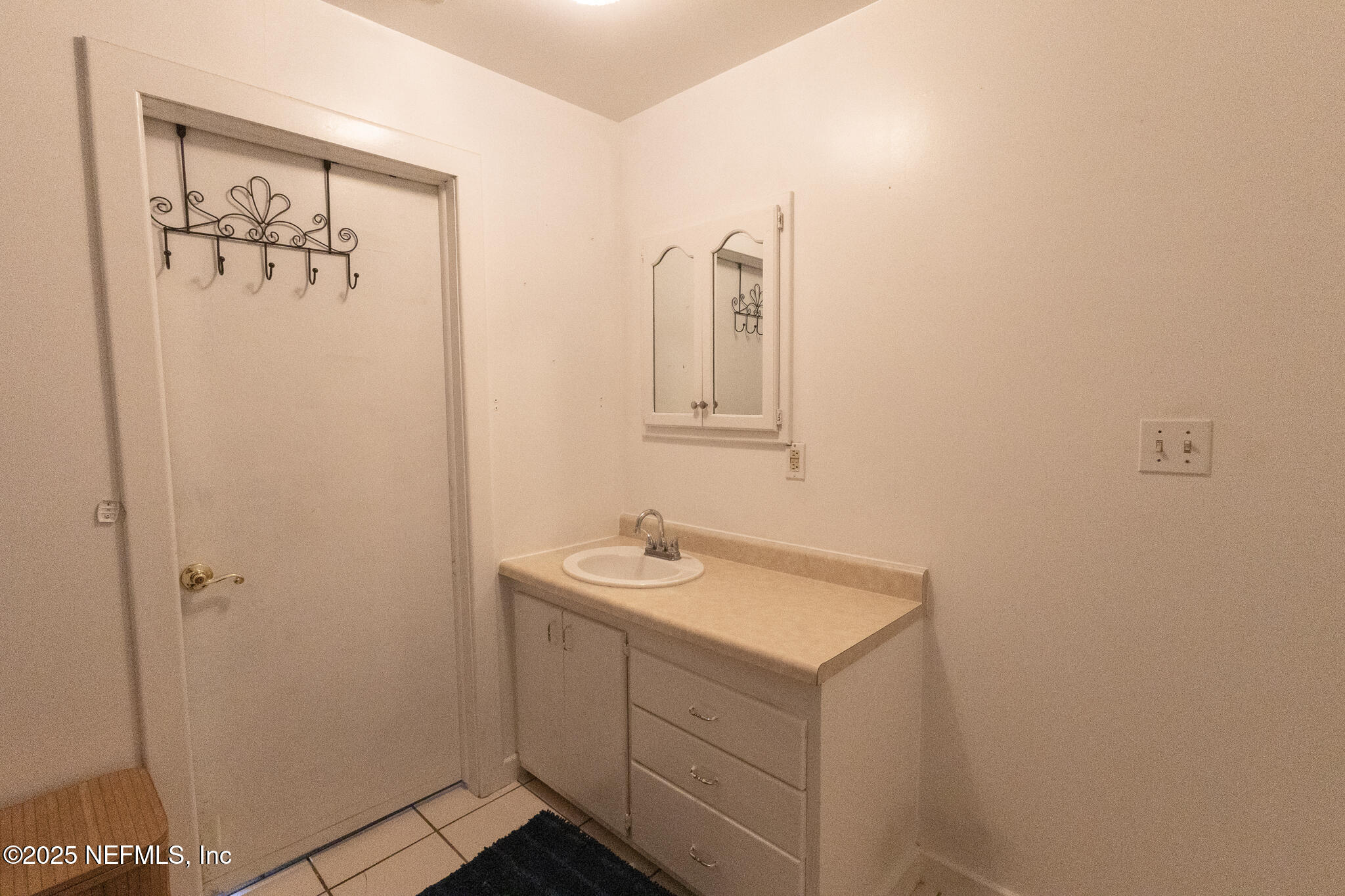 128 Devils Elbow Palatka, FL 32177 - Photo 15 of 38 a bathroom with a sink and a mirror