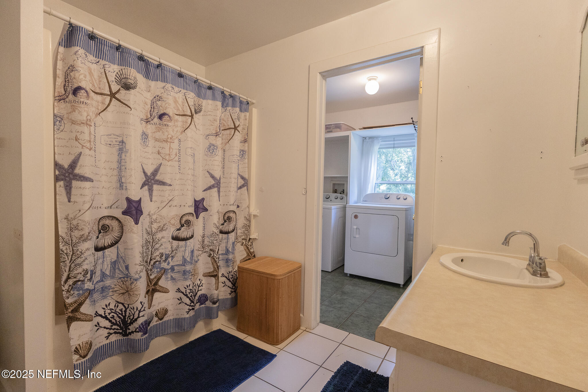 128 Devils Elbow Palatka, FL 32177 - Photo 17 of 38 a bathroom with a sink and mirror