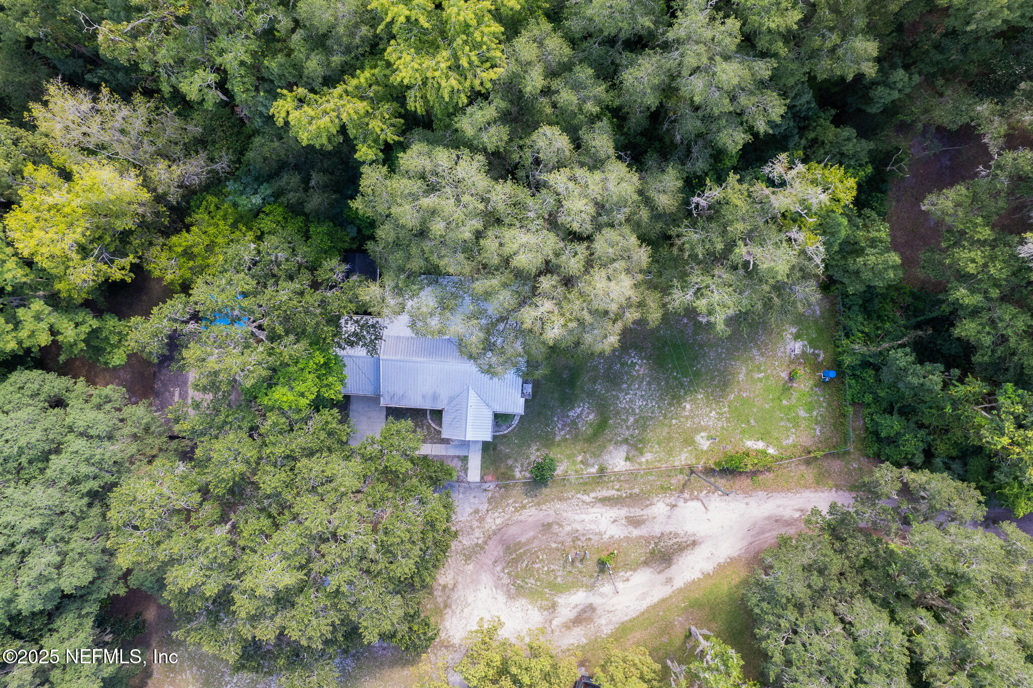 128 Devils Elbow Palatka, FL 32177 - Photo 26 of 38 an aerial view of a house with a yard