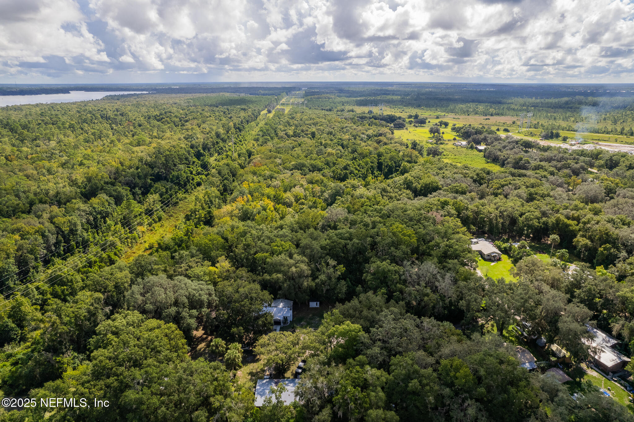 128 Devils Elbow Palatka, FL 32177 - Photo 34 of 38 a view of a lake with a city