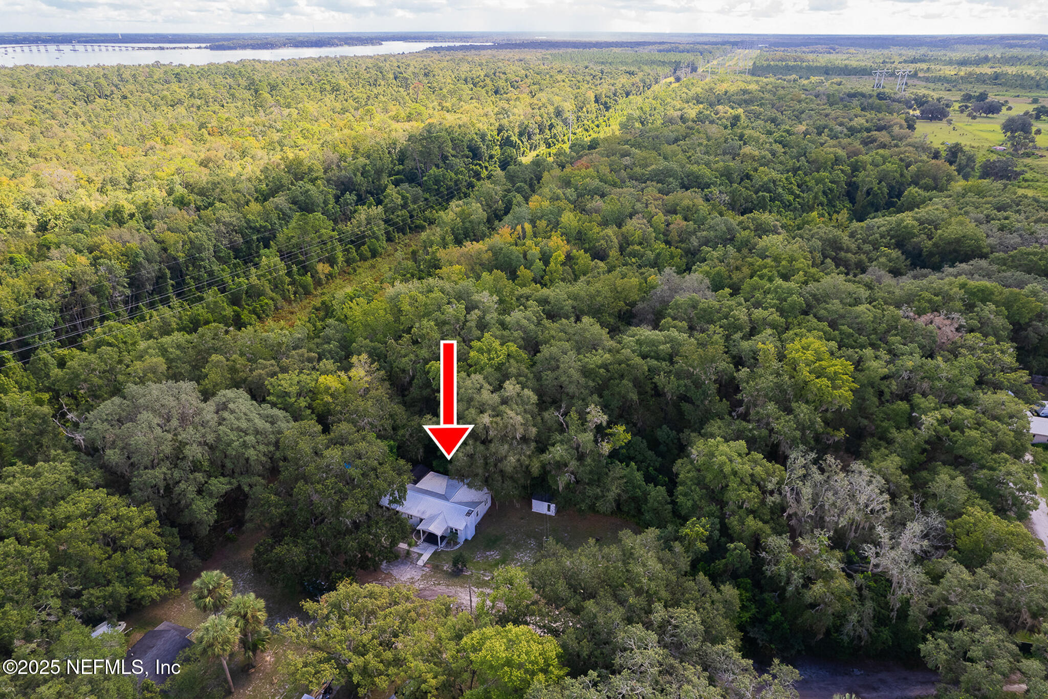 128 Devils Elbow Palatka, FL 32177 - Photo 37 of 38 a view of a outdoor space and a lake view