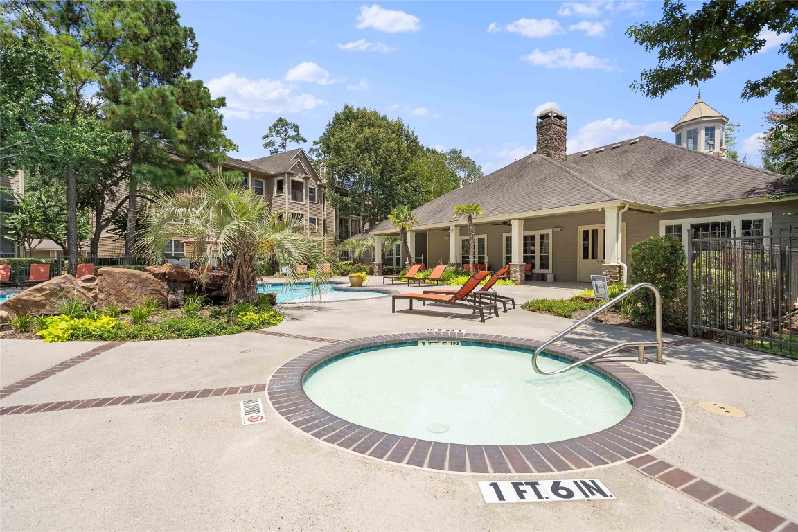 2400-1033 Spring Rain Drive Spring, TX 77379 - Photo 34 of 35 a view of a patio with swimming pool