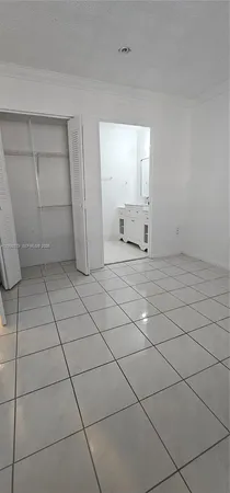 a bathroom with a bathtub and a toilet