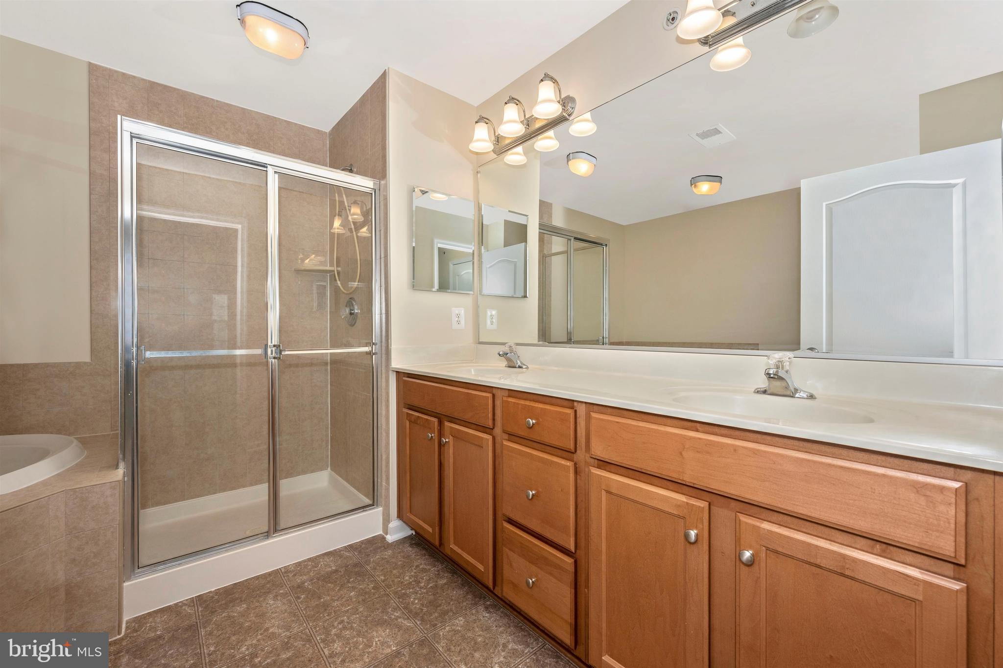11525 Georgia Avenue Silver Spring, MD 20902 - Photo 34 of 44 MASTER BATH WITH SOAKING TUB AND SEPARATE SHOWER