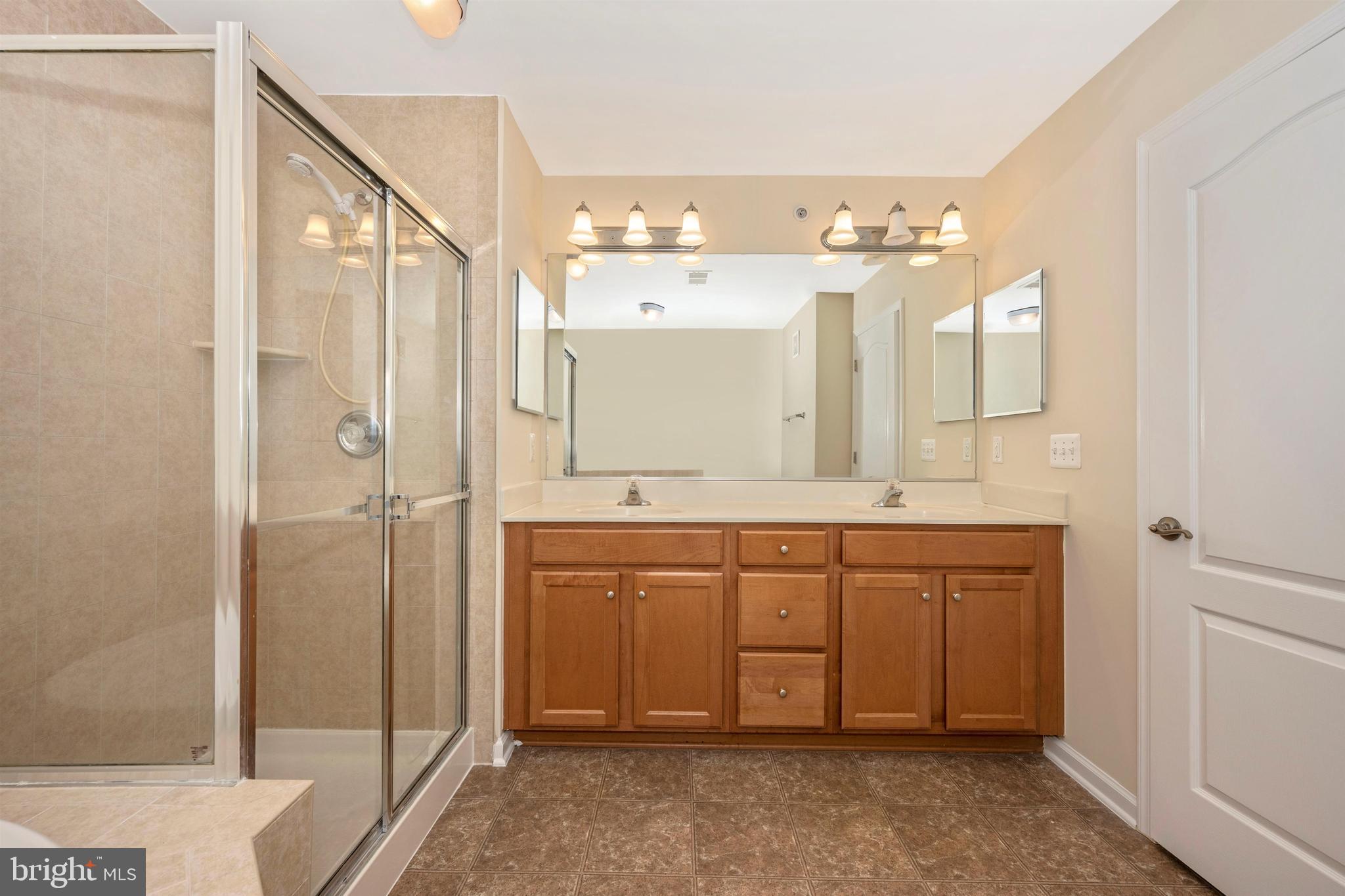 11525 Georgia Avenue Silver Spring, MD 20902 - Photo 36 of 44 MASTER BATH WITH SOAKING TUB AND SEPARATE SHOWER
