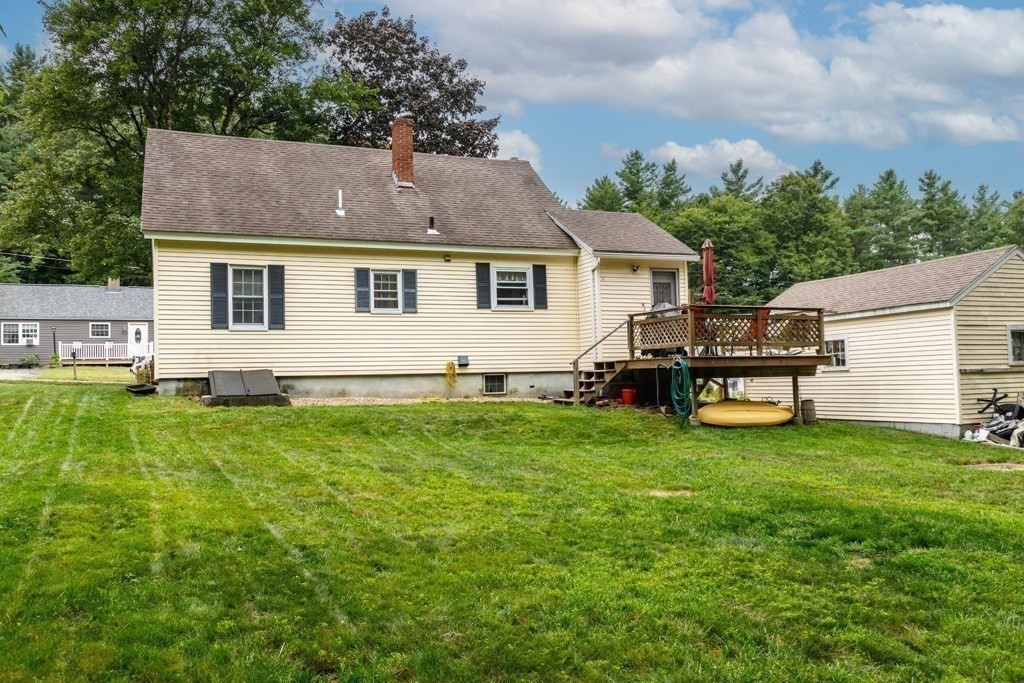 14 Baker Lane Templeton, MA 01468 - Photo 16 of 21 a view of a house with a backyard