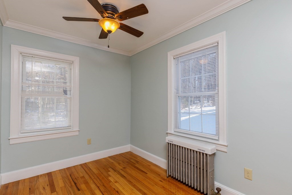 14 Baker Lane Templeton, MA 01468 - Photo 8 of 21 a view of an empty room with window and wooden floor