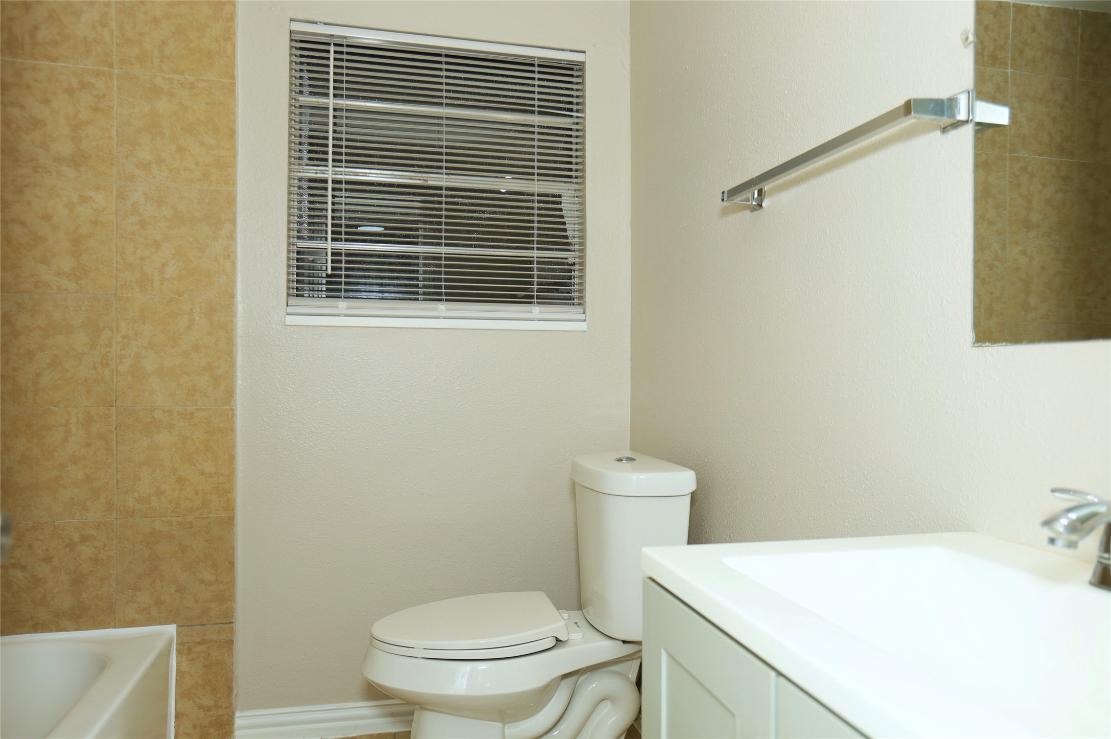123 West 6th Street Freeport, TX 77541 - Photo 9 of 10 a bathroom with a sink a toilet and a shower