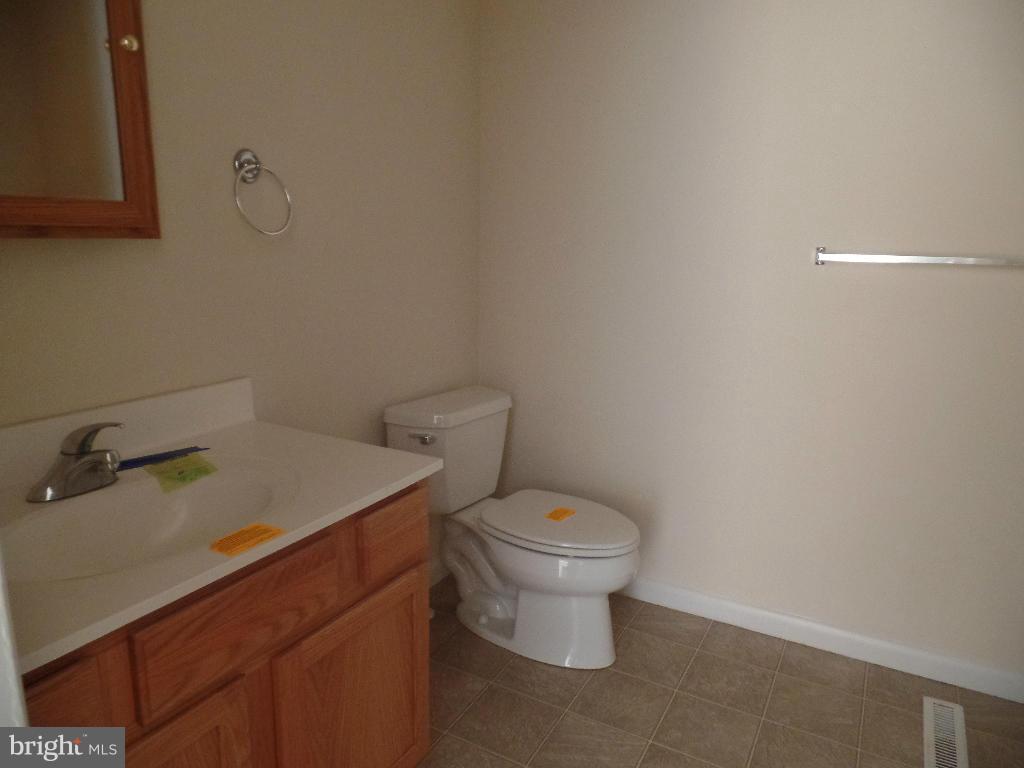 212 Ewingtown Road Church Hill, MD 21623 - Photo 6 of 10 a bathroom with a sink and a toilet
