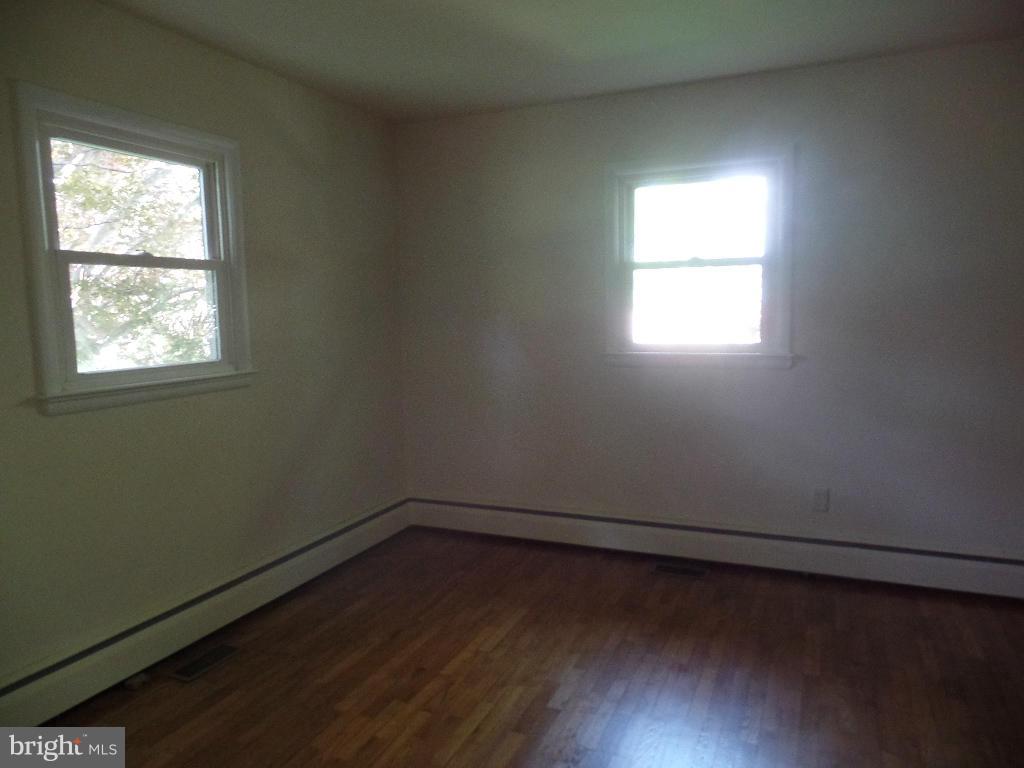 212 Ewingtown Road Church Hill, MD 21623 - Photo 9 of 10 an empty room with a window