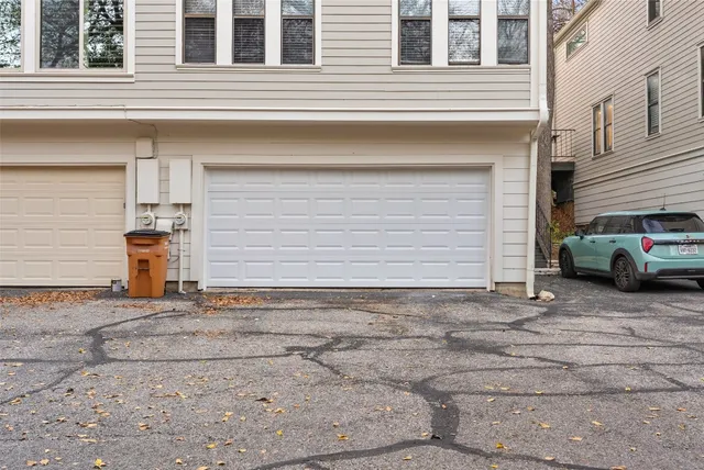 a side view of a house with garage