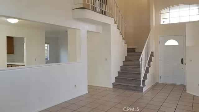 a view of entryway with stairs