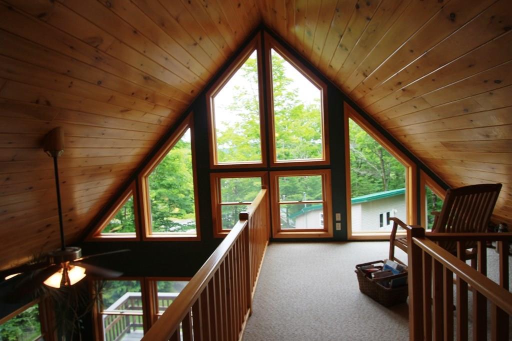 558 Rockwood Road Greenville Junction, ME 04442 - Photo 25 of 31 Loft area giving home the open...