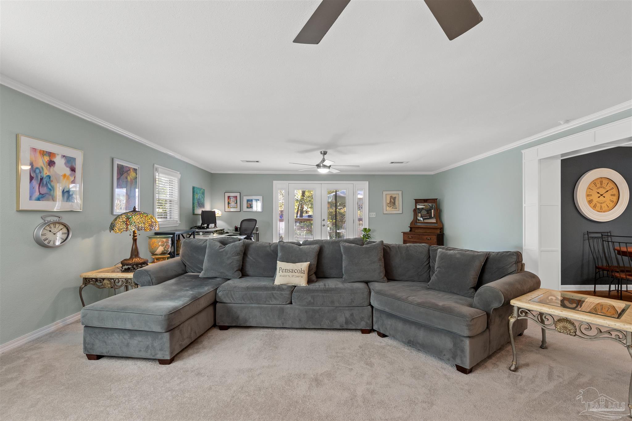 6001 Hilltop Road Pensacola, FL 32504 - Photo 14 of 37 a living room with furniture and a flat screen tv