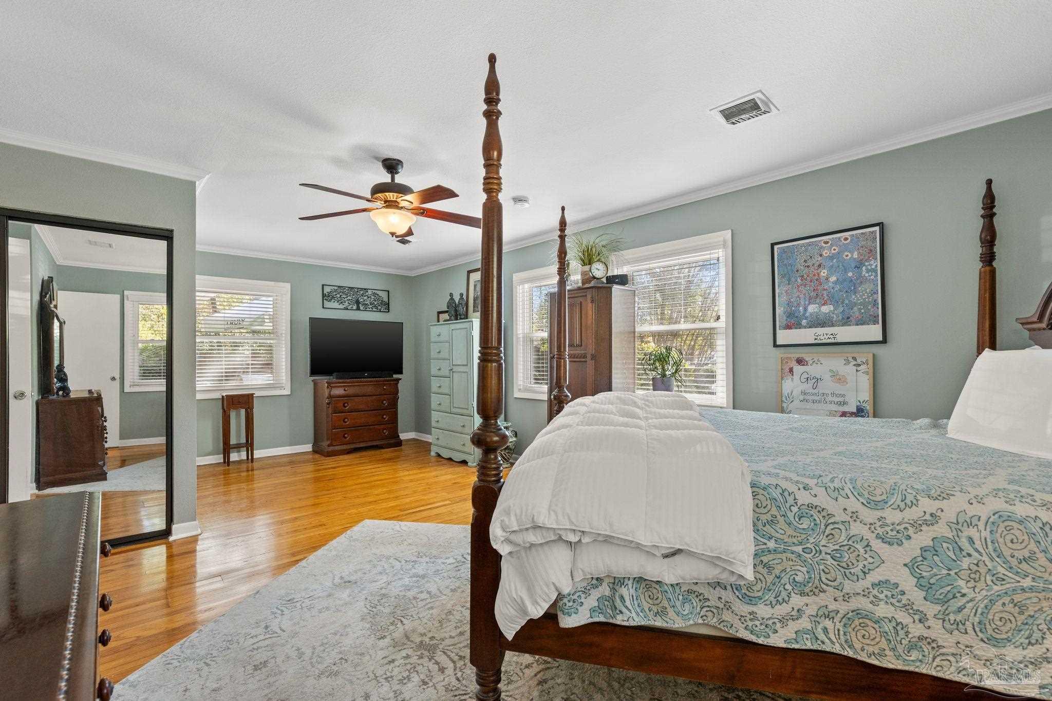 6001 Hilltop Road Pensacola, FL 32504 - Photo 25 of 37 a living room with furniture and a flat screen tv