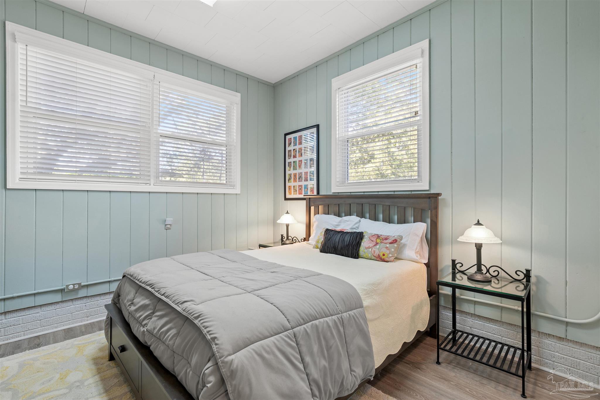 6001 Hilltop Road Pensacola, FL 32504 - Photo 28 of 37 a bedroom with a bed and window