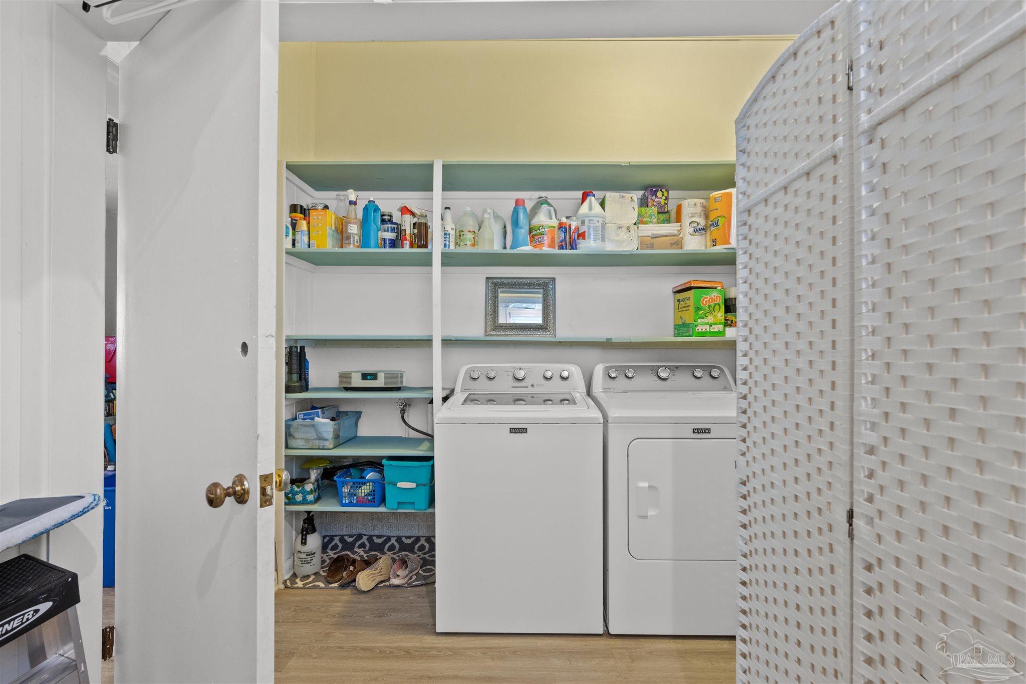 6001 Hilltop Road Pensacola, FL 32504 - Photo 29 of 37 a view of storage and utility room with washer and dryer