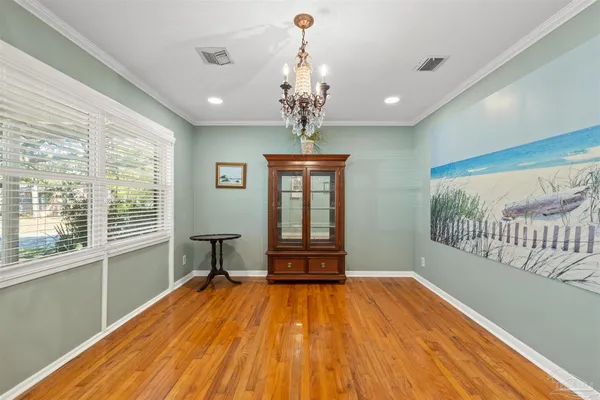 a view of a dining room with furniture
