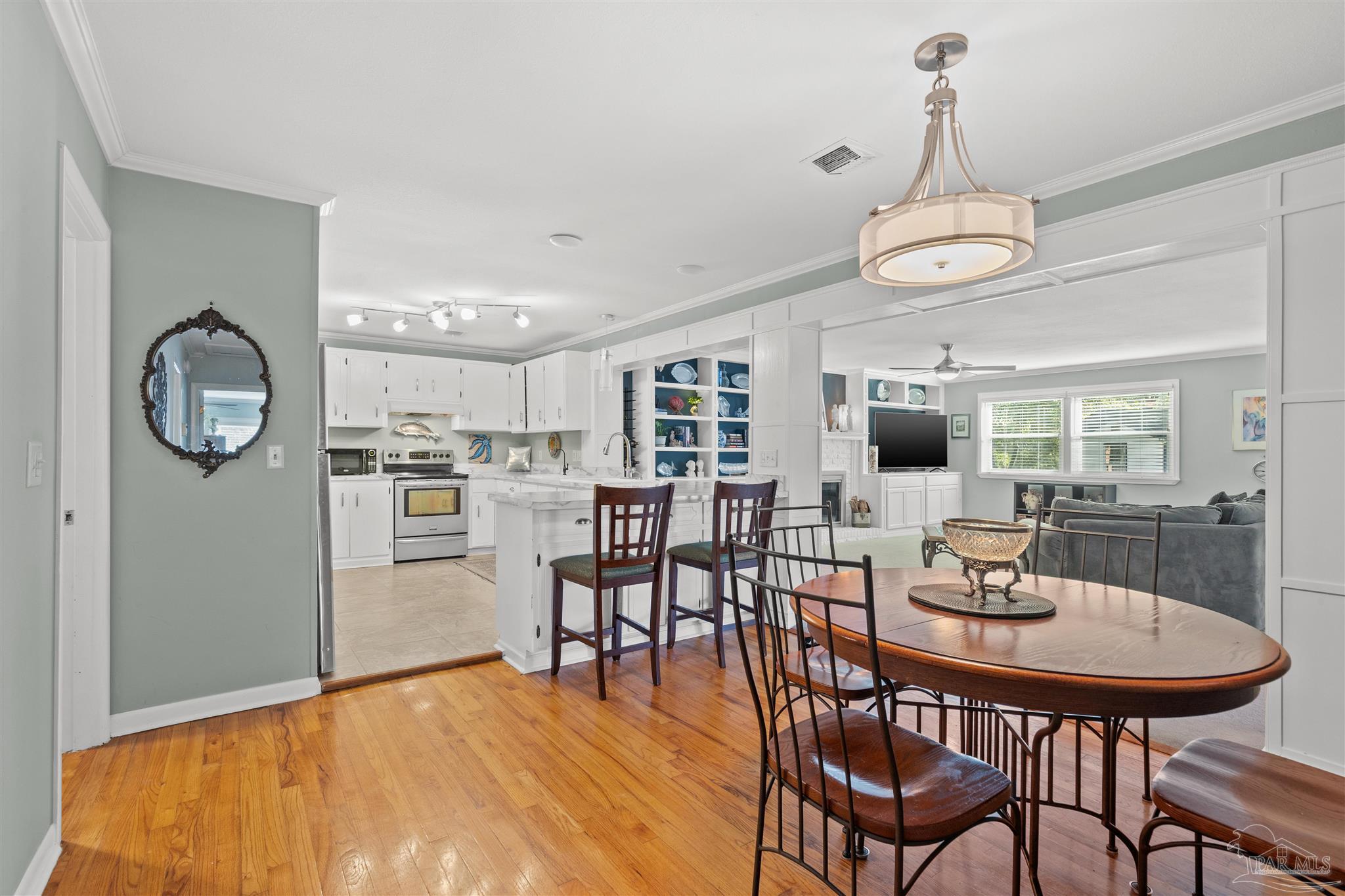 6001 Hilltop Road Pensacola, FL 32504 - Photo 10 of 37 a view of a dining room with furniture