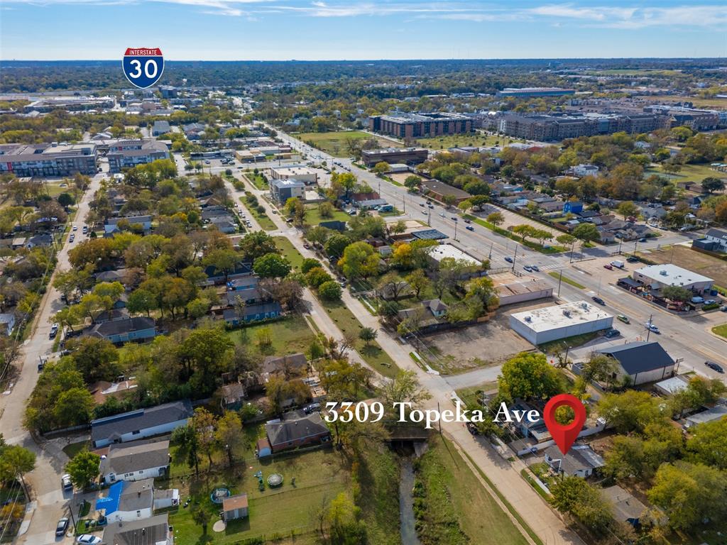 3309 Topeka Avenue Dallas, TX 75212 - Photo 7 of 11 an aerial view of residential houses with outdoor space