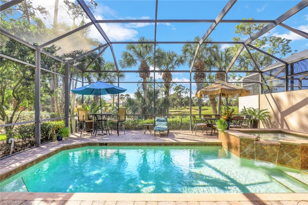 a view of a swimming pool with a patio