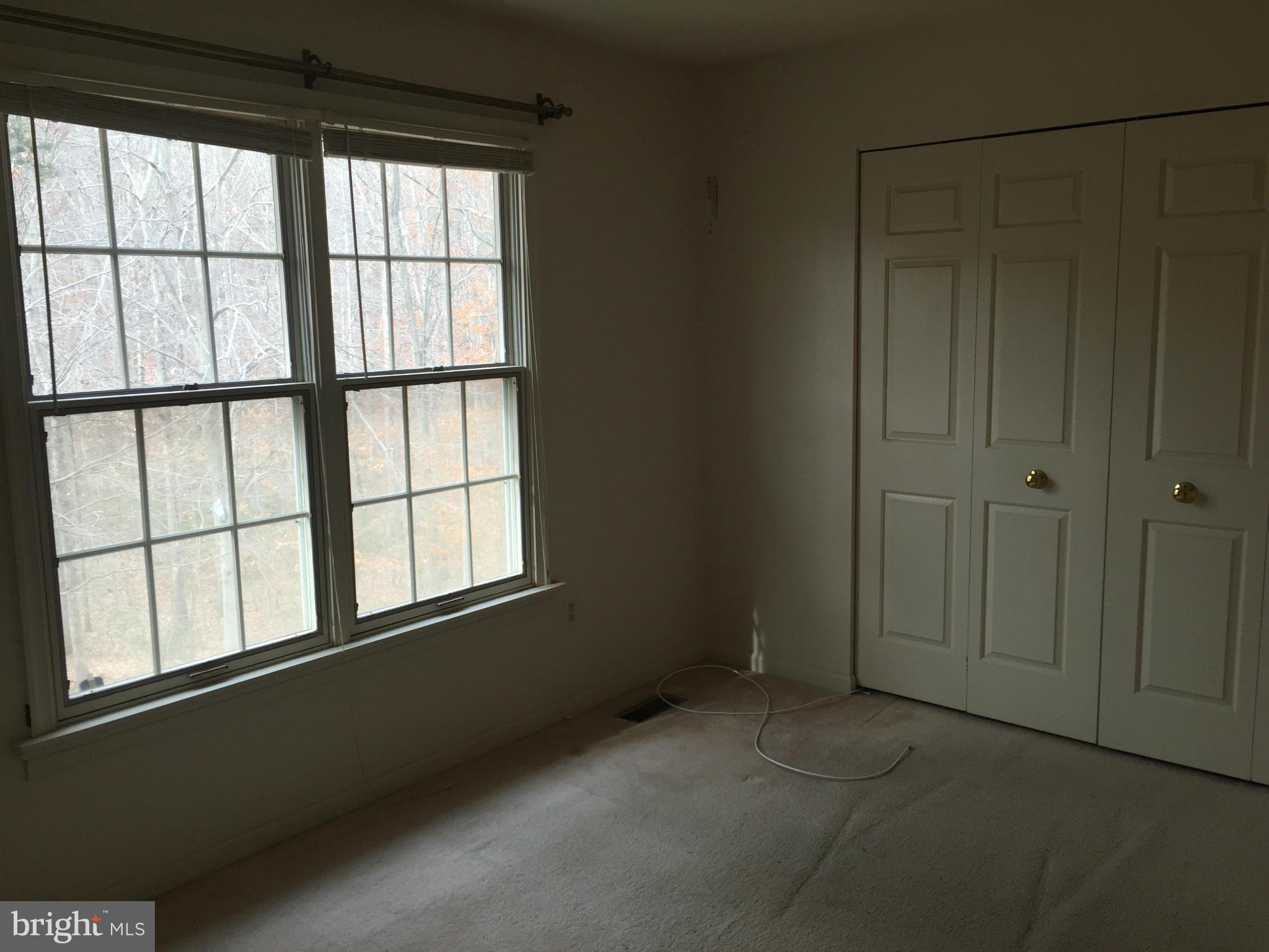 3969 Pepperidge Court Woodbridge, VA 22192 - Photo 4 of 11 a view of an empty room with a window