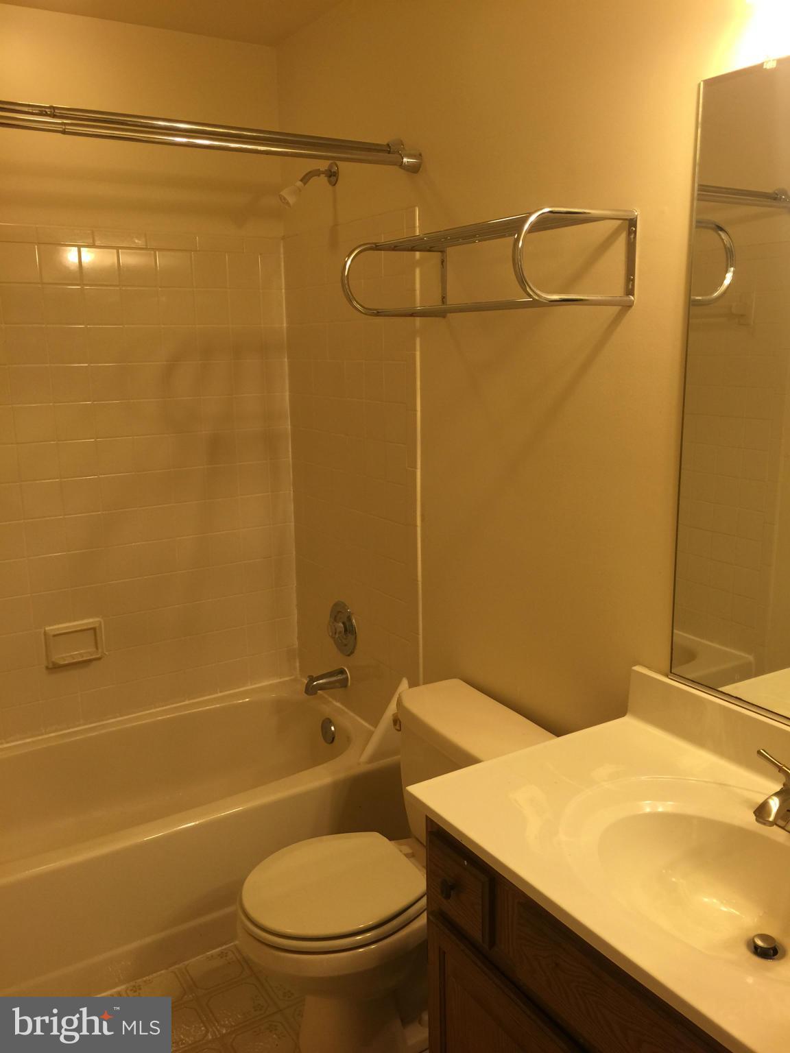 3969 Pepperidge Court Woodbridge, VA 22192 - Photo 5 of 11 a bathroom with a sink toilet and shower