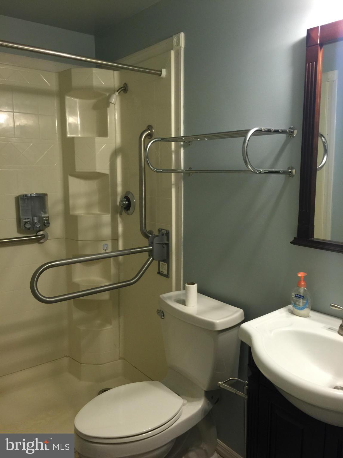 3969 Pepperidge Court Woodbridge, VA 22192 - Photo 9 of 11 a bathroom with a sink a toilet and shower