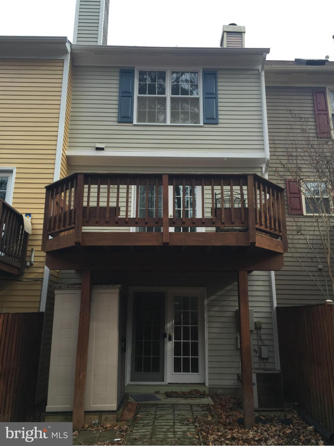 3969 Pepperidge Court Woodbridge, VA 22192 - Photo 10 of 11 a front view of a house with balcony