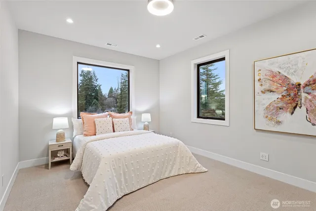 a bedroom with a bed and a walk in closet