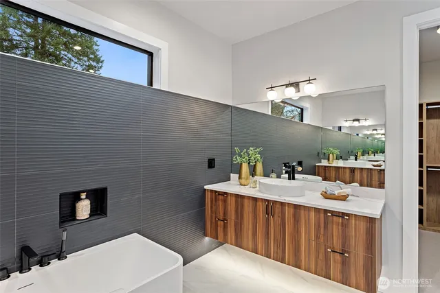 a kitchen with a sink and a stove top oven