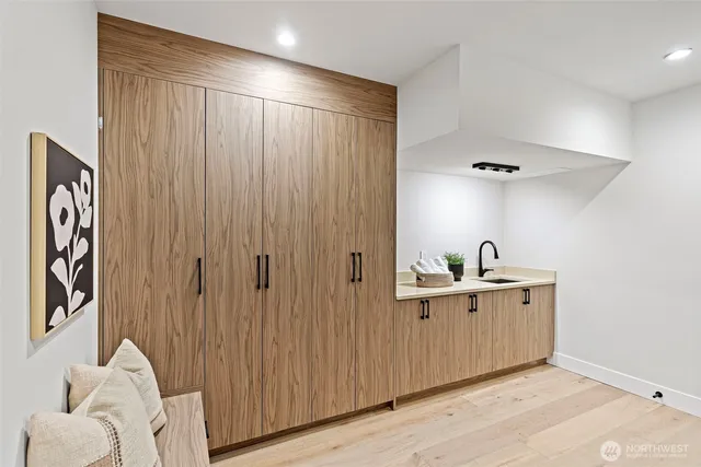 a view of a patio with couple of chairs and a couch