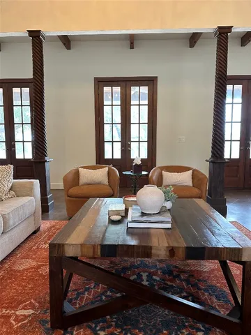 a living room with furniture and window