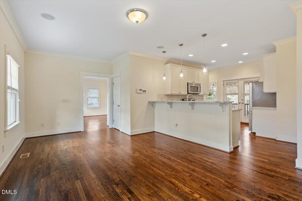 2718 Peachtree Street Raleigh, NC 27608 - Photo 12 of 38 a view of kitchen with wooden floor