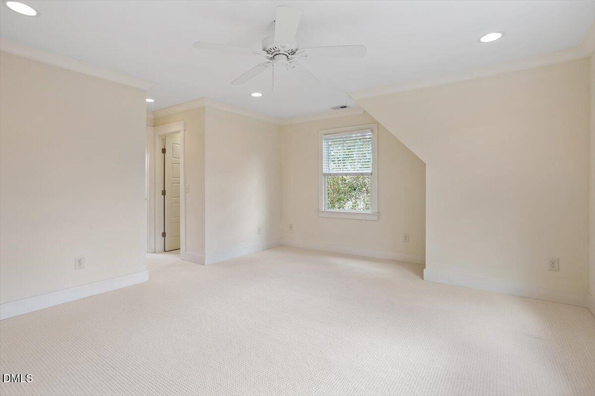 2718 Peachtree Street Raleigh, NC 27608 - Photo 23 of 38 an empty room with windows and closet