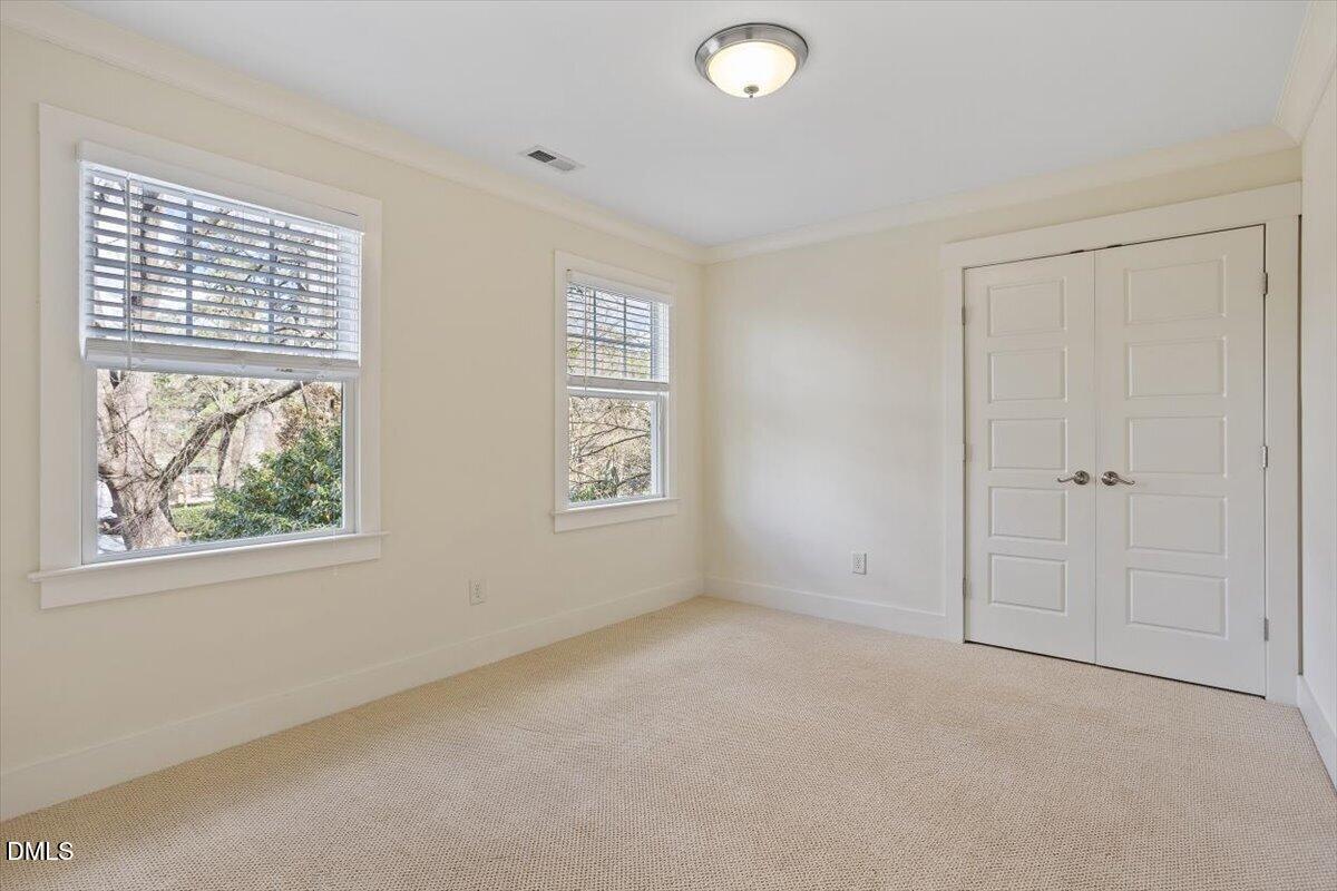 2718 Peachtree Street Raleigh, NC 27608 - Photo 26 of 38 an empty room with windows