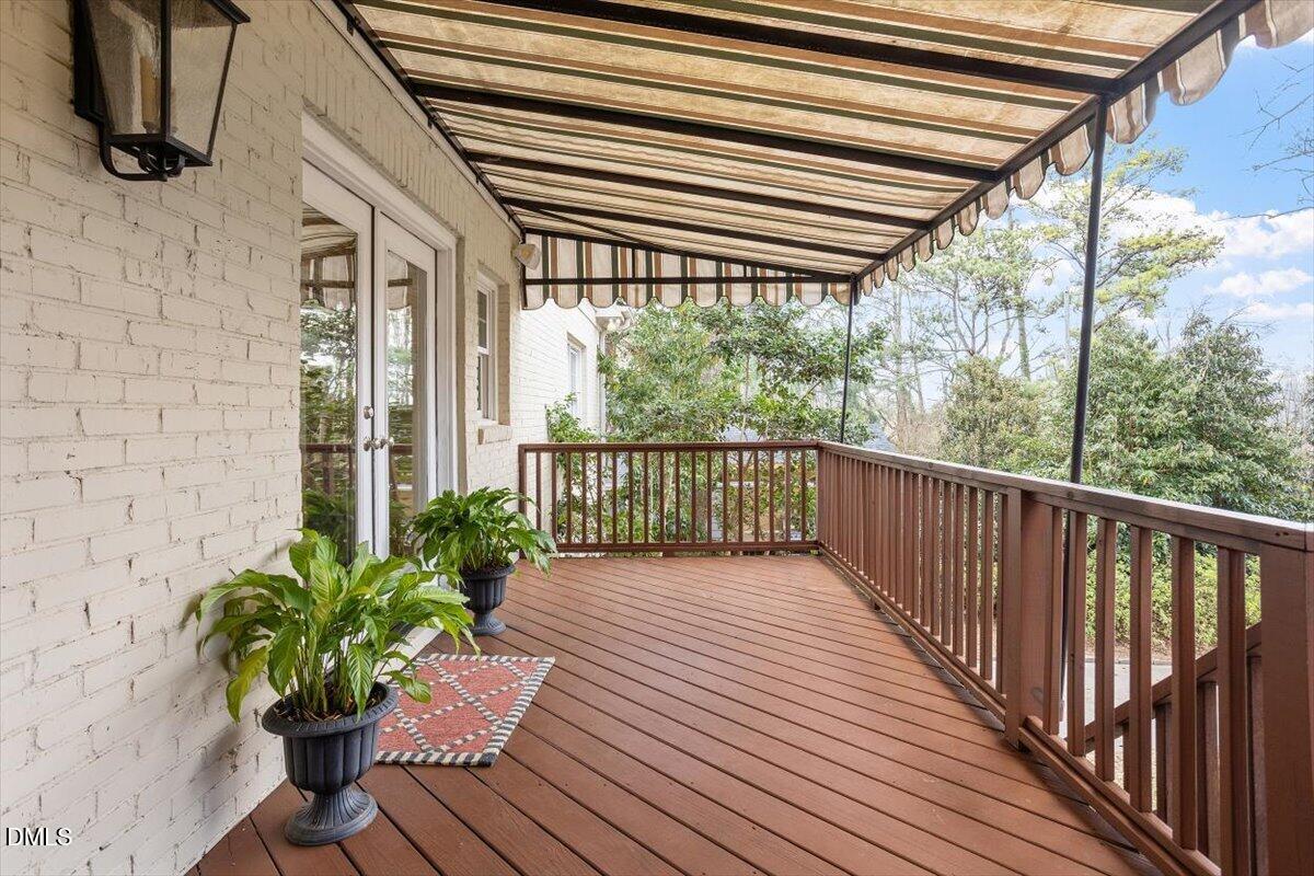 2718 Peachtree Street Raleigh, NC 27608 - Photo 31 of 38 a balcony with wooden floor