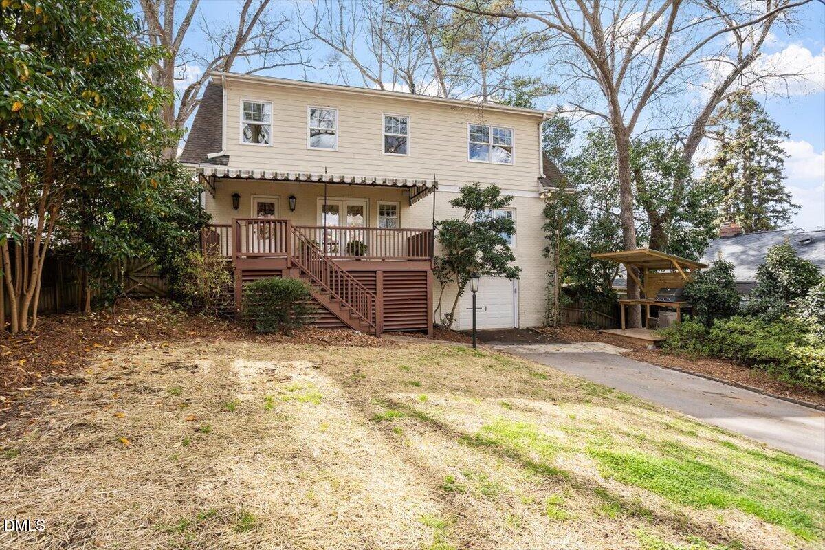 2718 Peachtree Street Raleigh, NC 27608 - Photo 33 of 38 a view of a house with backyard and sitting area