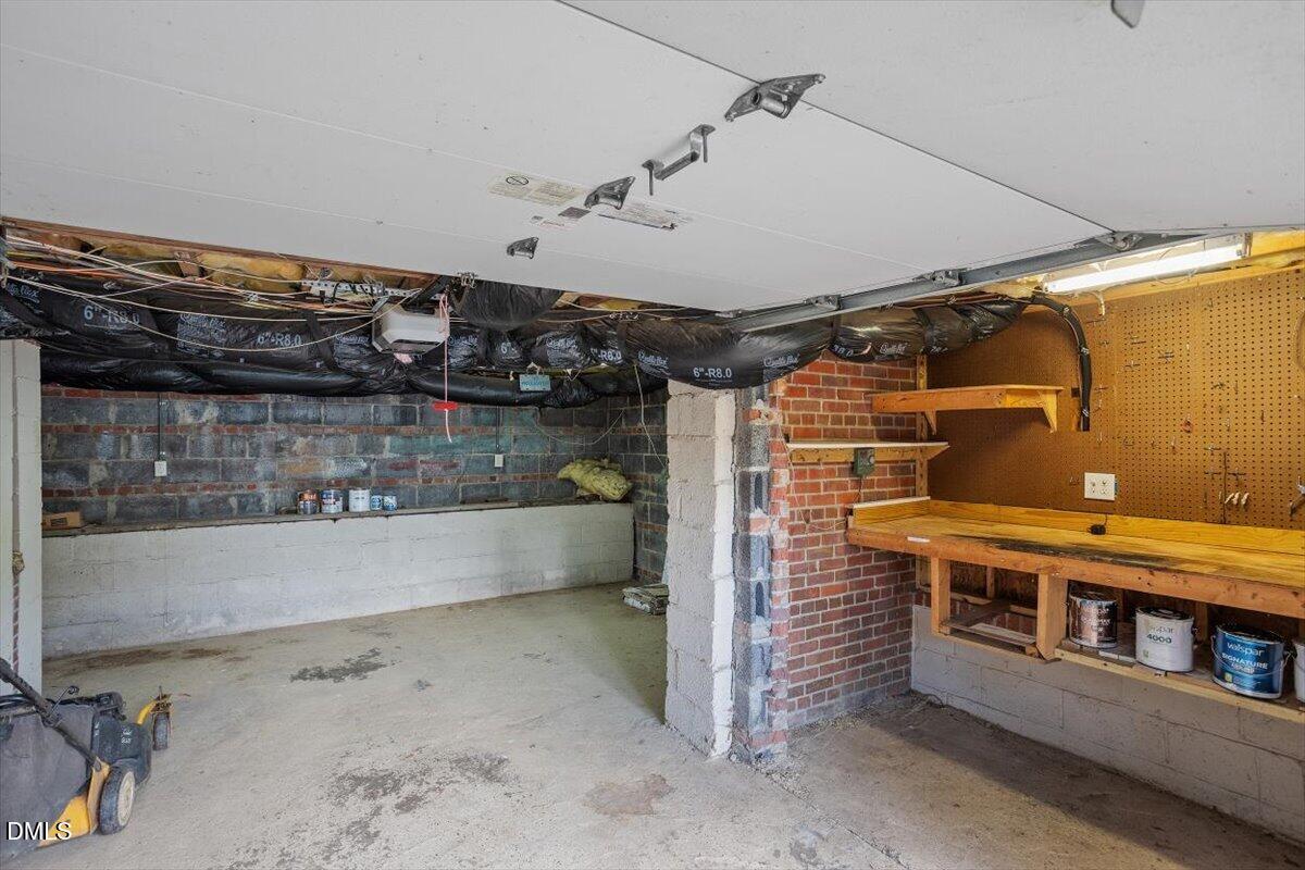 2718 Peachtree Street Raleigh, NC 27608 - Photo 37 of 38 a view of a room with racks on the wall