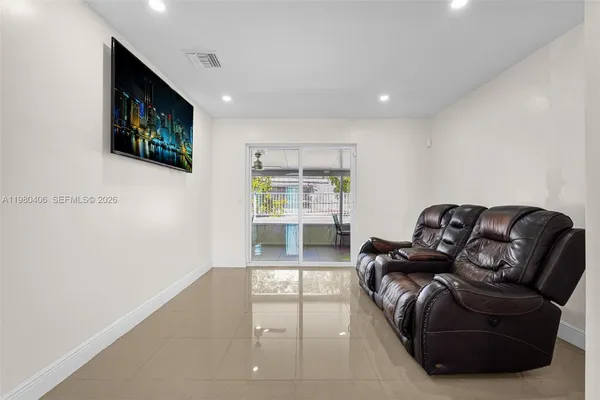 a view of a dining room with furniture window and outside view