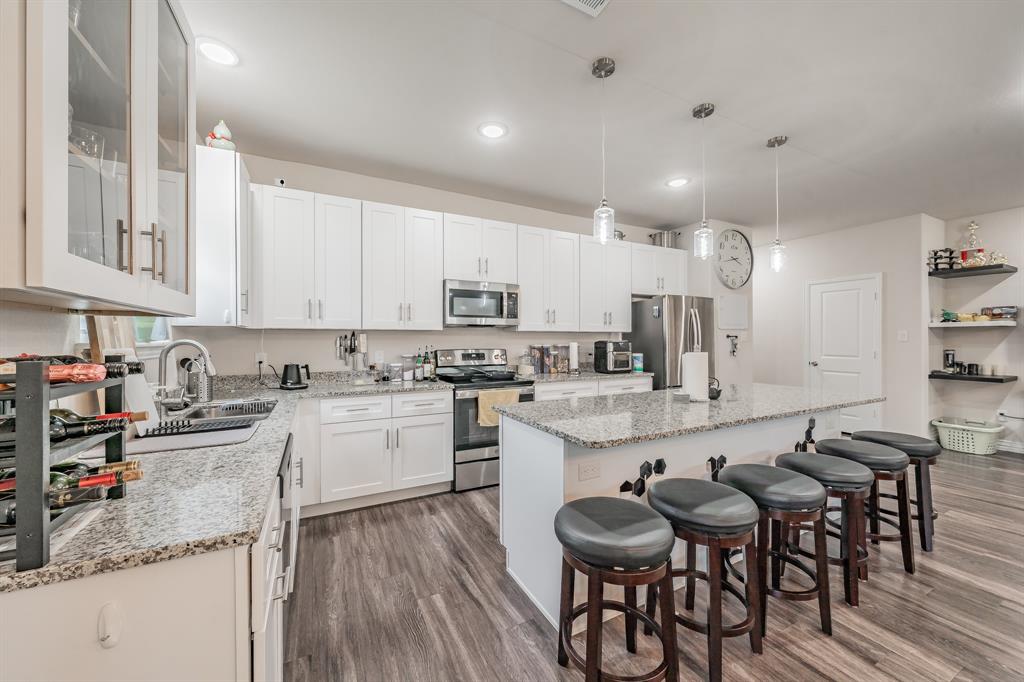 3501 Dillard Street Fort Worth, TX 76105 - Photo 12 of 39 Kitchen sink features a water filtration system, no need to buy water bottles.
