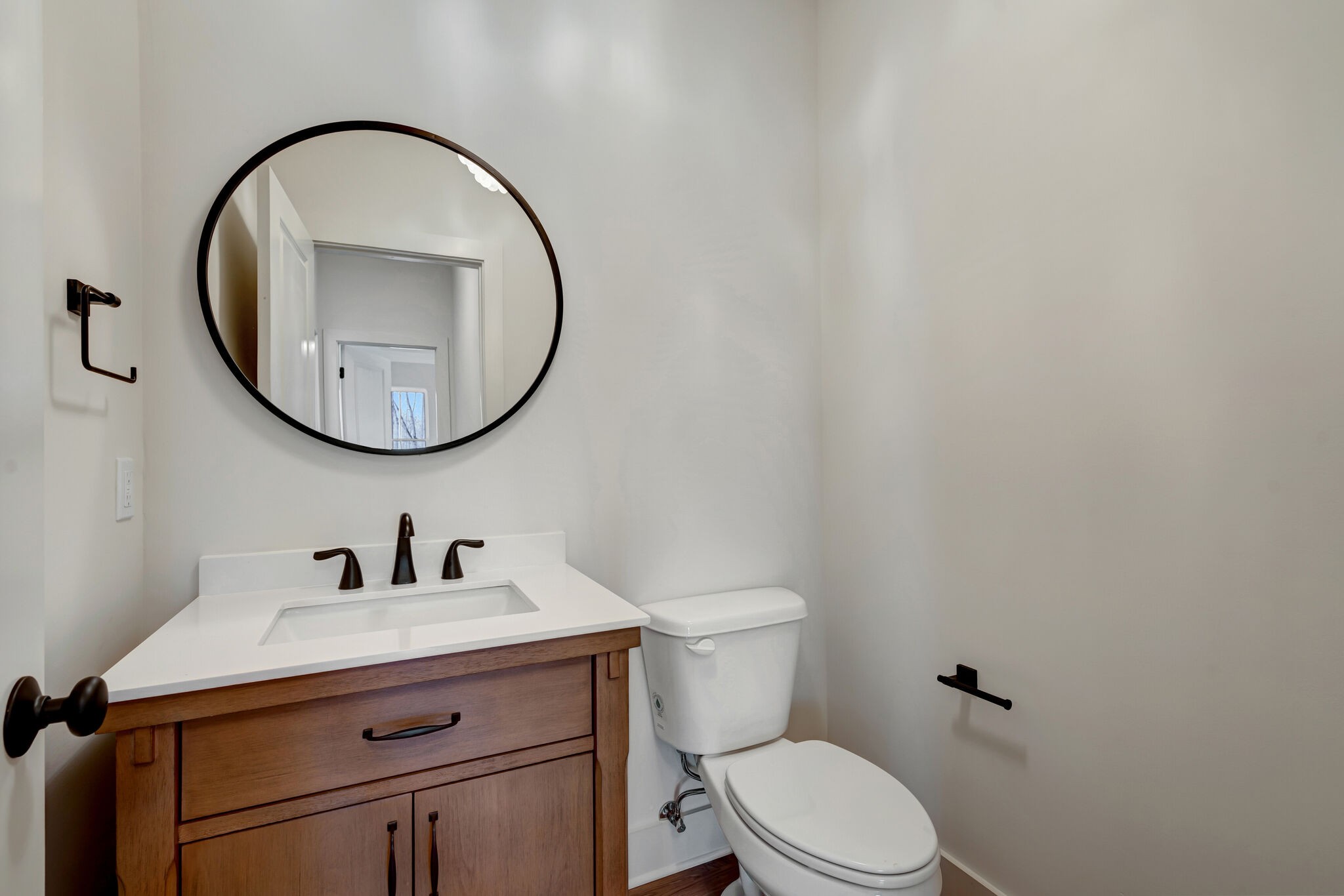 1325 Campbell Ridge Road Kingston Springs, TN 37082 - Photo 19 of 42 a bathroom with a toilet a sink and a mirror