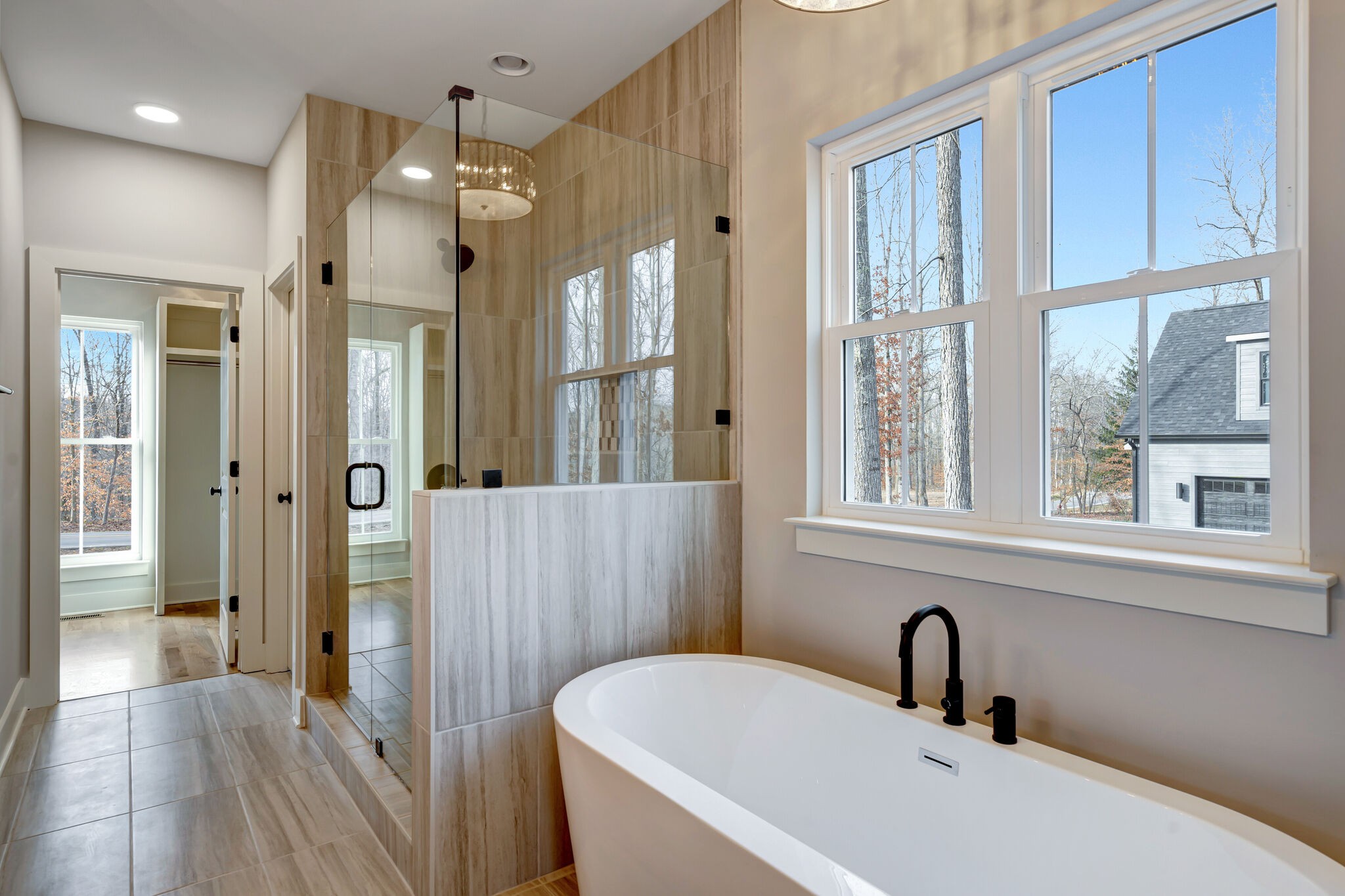 1325 Campbell Ridge Road Kingston Springs, TN 37082 - Photo 23 of 42 a bathroom with a sink a large mirror and shower