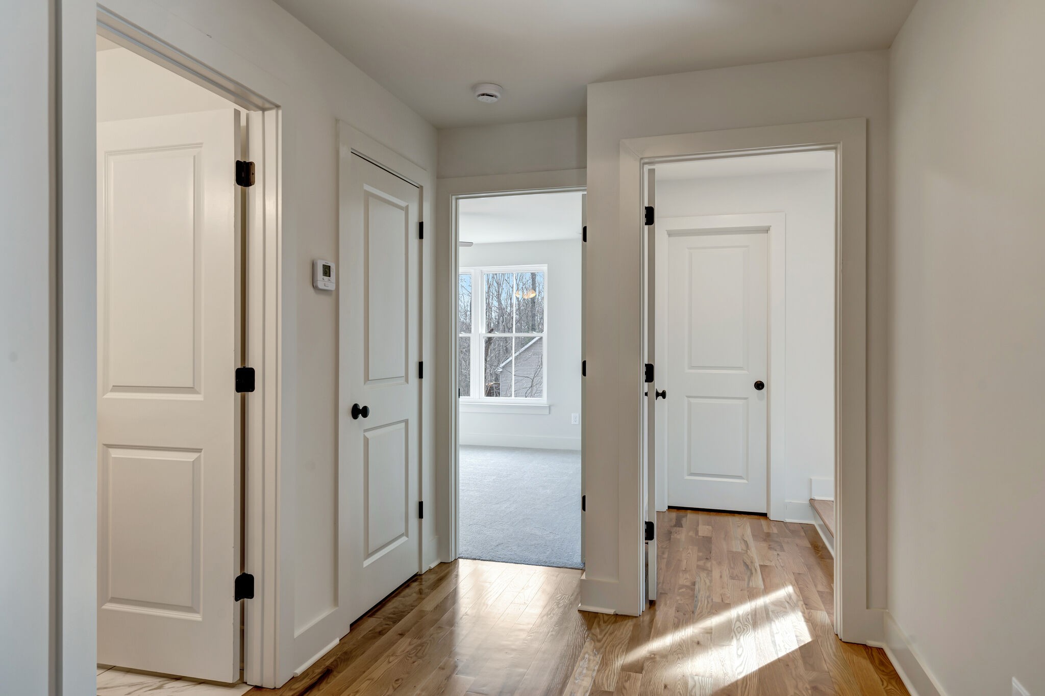 1325 Campbell Ridge Road Kingston Springs, TN 37082 - Photo 28 of 42 a view of a hallway with wooden floor
