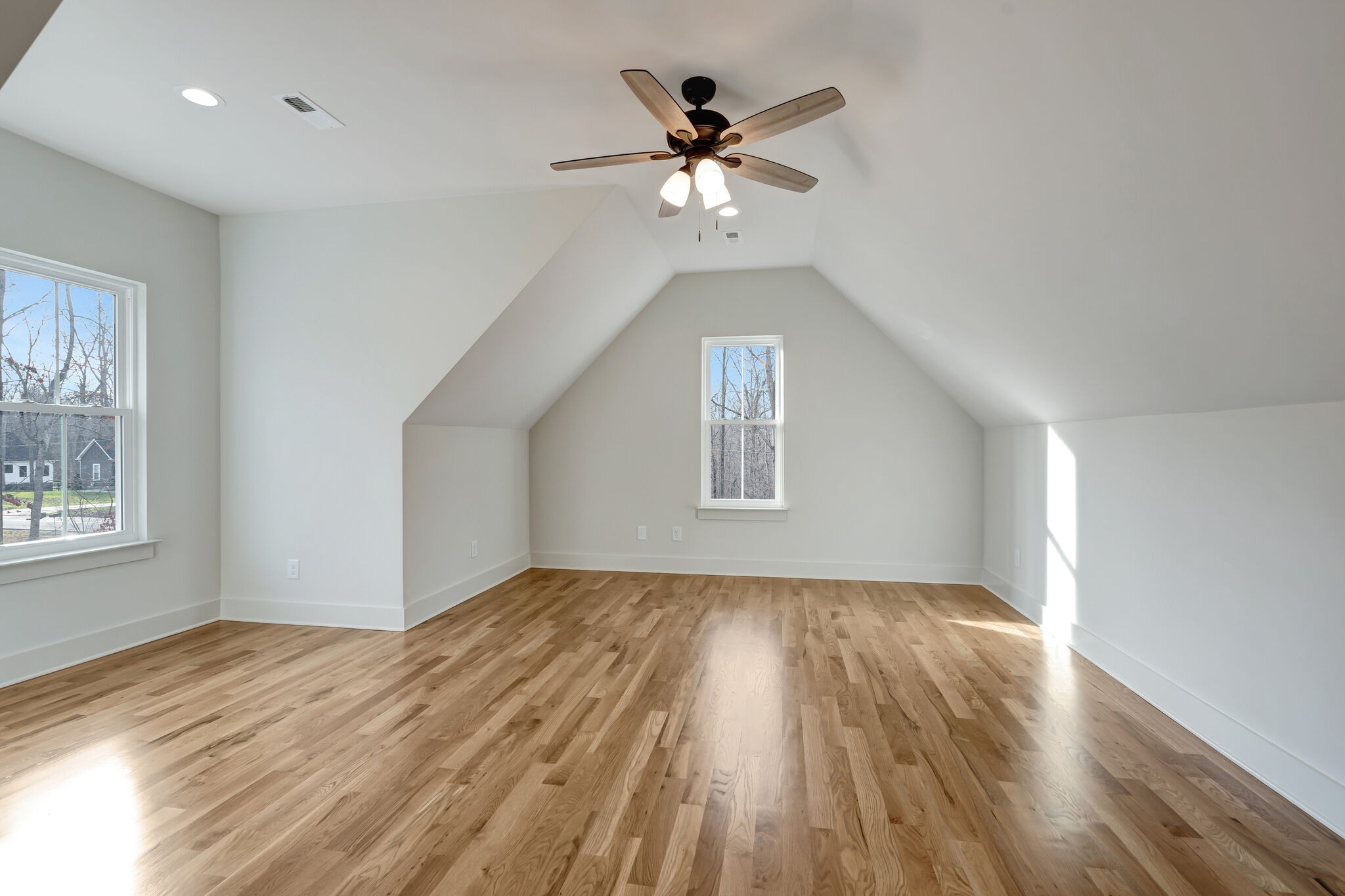 1325 Campbell Ridge Road Kingston Springs, TN 37082 - Photo 36 of 42 a view of an empty room with a window and wooden floor