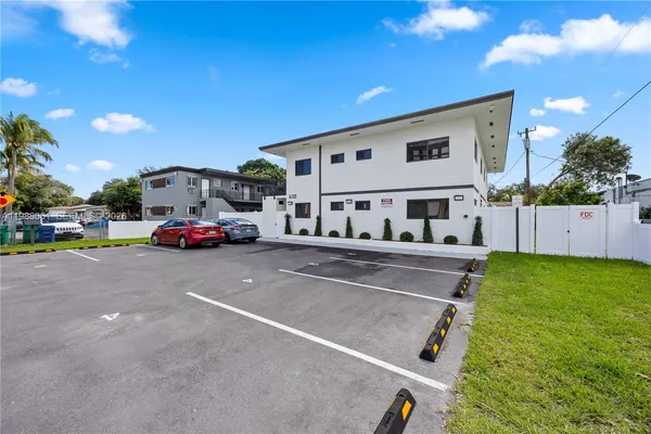 a view of street with parked cars