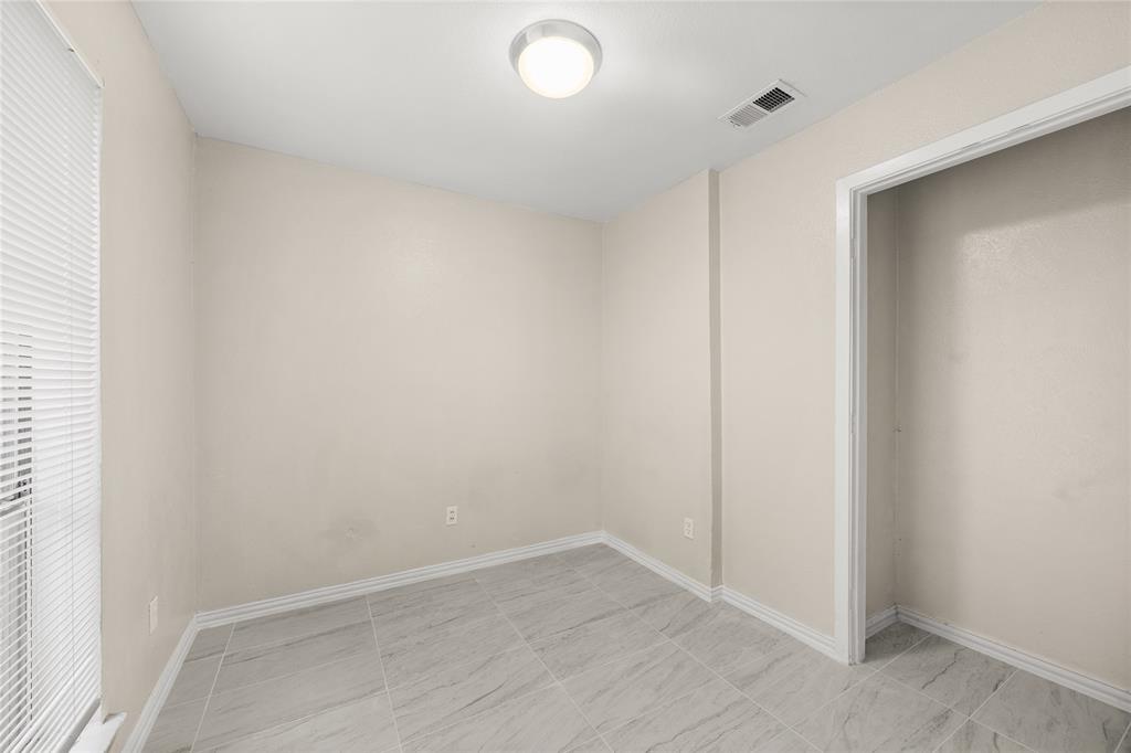8110 Skillman Street, Unit 2053 Dallas, TX 75231 - Photo 11 of 12 a view of an empty room