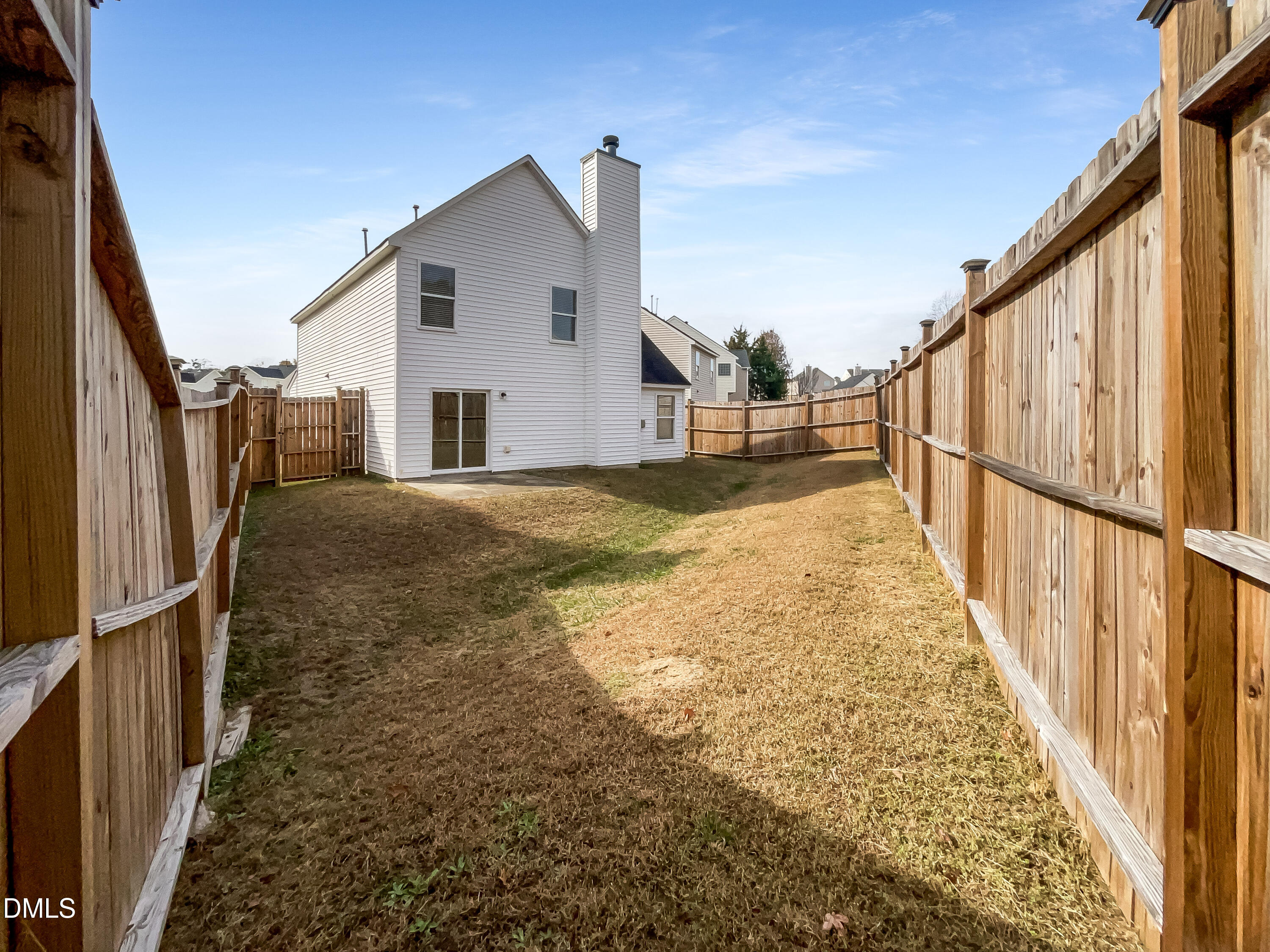 2504 Landale Court Raleigh, NC 27610 - Photo 15 of 16 a view of a house with wooden floor in a corridor