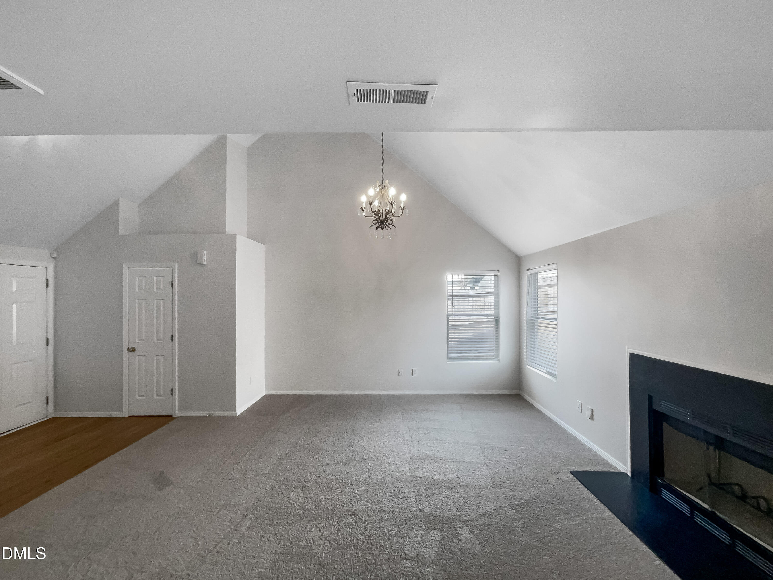2504 Landale Court Raleigh, NC 27610 - Photo 4 of 16 a view of a livingroom with a fireplace