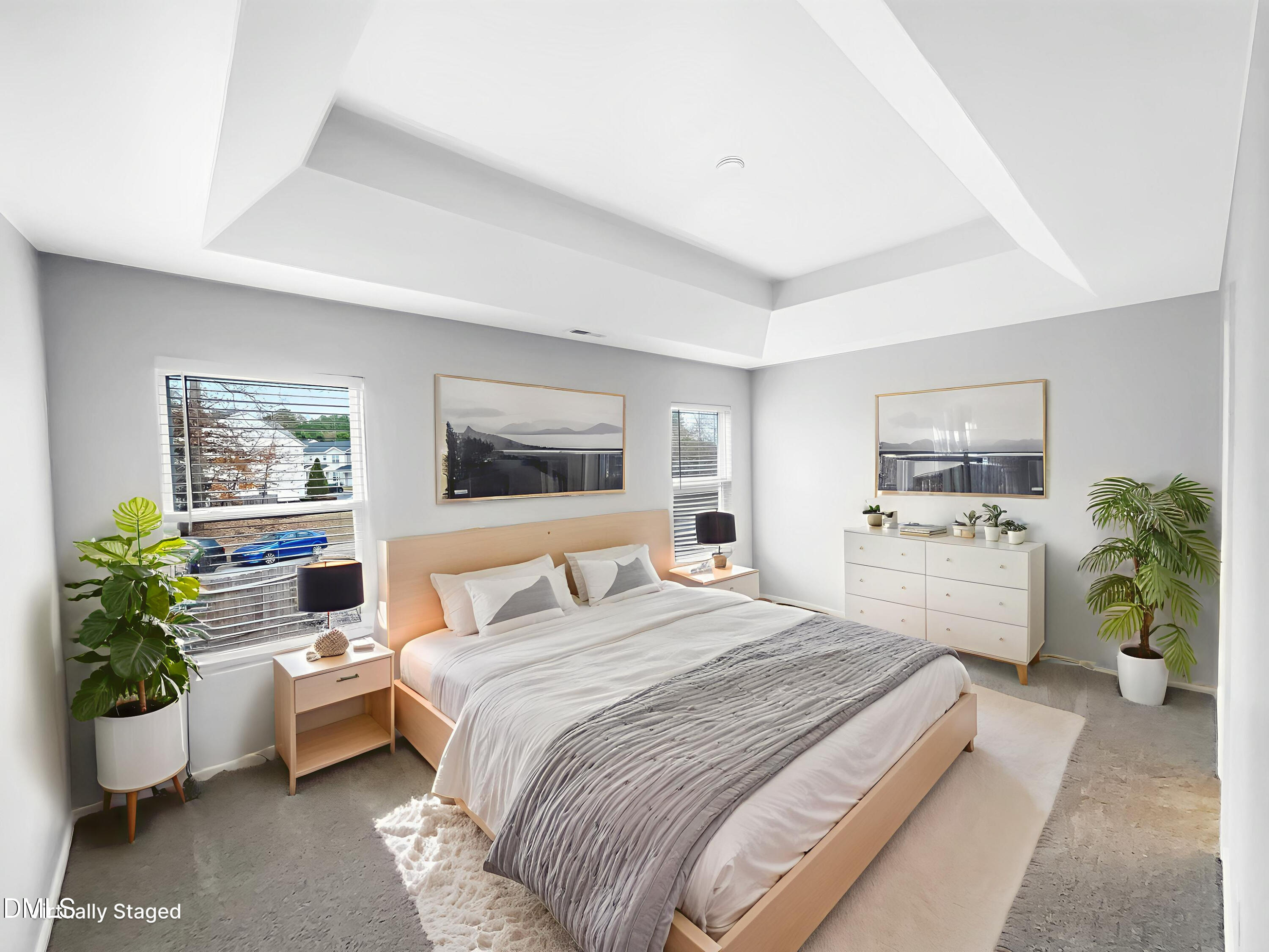 2504 Landale Court Raleigh, NC 27610 - Photo 9 of 16 a bedroom with a balcony a bed and a couch